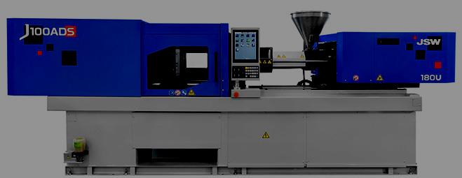 Heavy-duty JSW automated injection moulding system.
